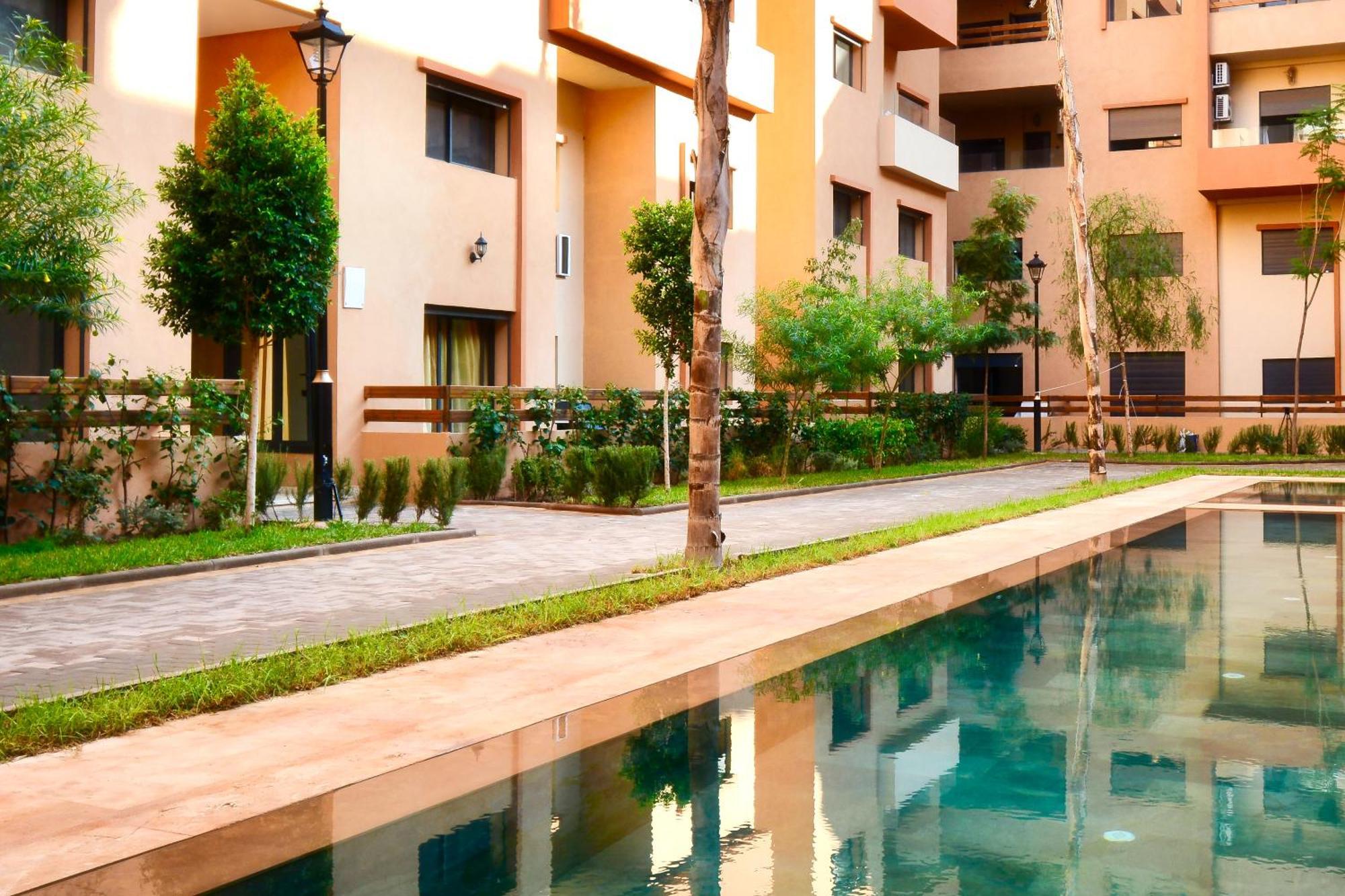 Appartement New Duplex- M Avenue , Swimming Pool , Fibre Optique Wifi , Parking , Gueliz Centre